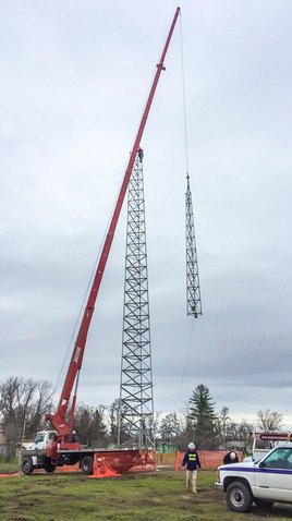 Completing the tower construction for the city of Walla Walla with the 30-ton crane
